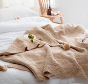 Nordic fringed knit ball blanket